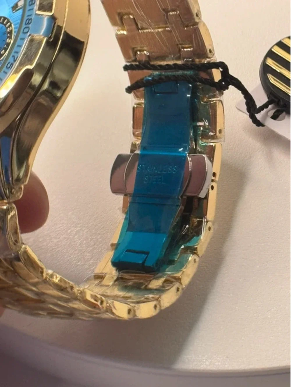AJ heavy stainless steel, gold tone, blue face Sports Master
